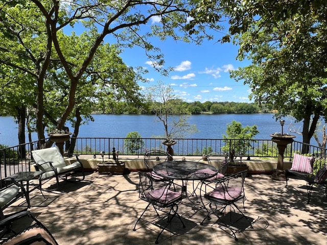 1260 Como Blvd E, Saint Paul, MN 55117 - view of patio featuring a water view
