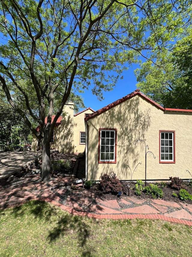 1260 Como Blvd E, Saint Paul, MN 55117 - view of home's exterior featuring stucco siding