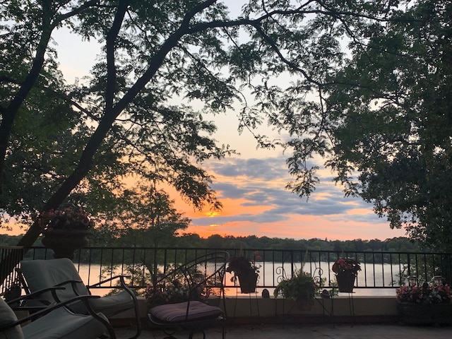 1260 Como Blvd E, Saint Paul, MN 55117 - view of patio featuring a water view