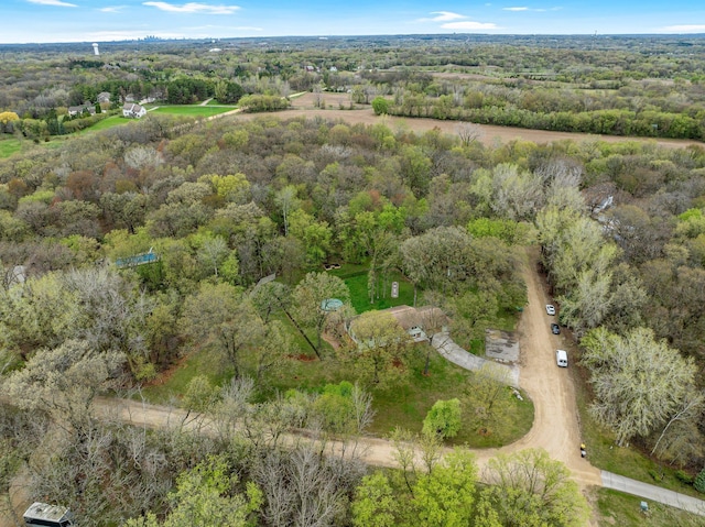 bird's eye view featuring a forest view