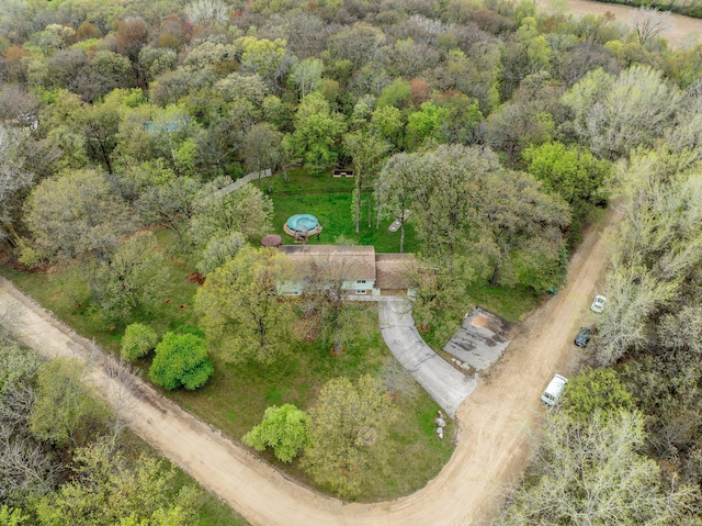 aerial view featuring a view of trees