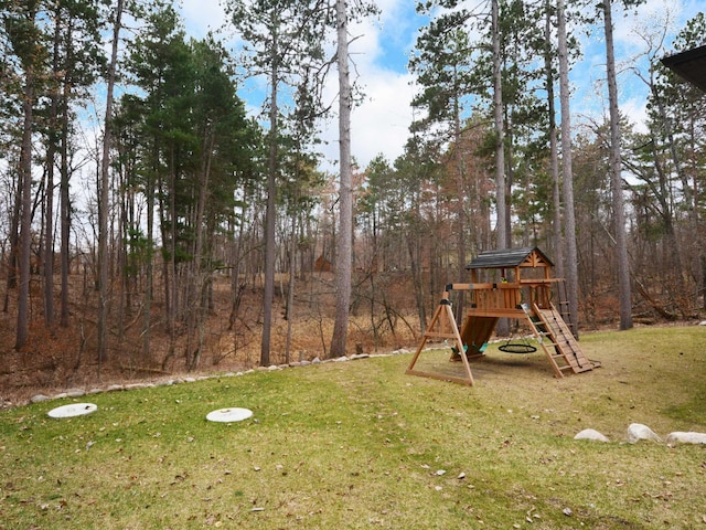 view of yard with a playground