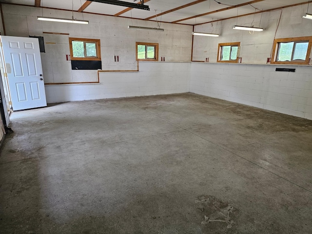 6788 39th Ave NW, Garfield, MN 56332 - garage featuring concrete block wall
