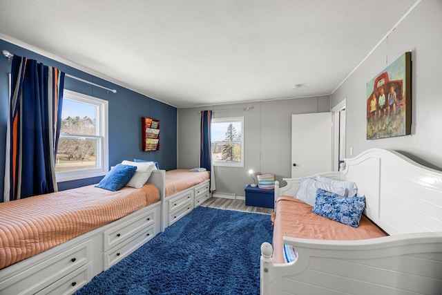 bedroom featuring light wood finished floors