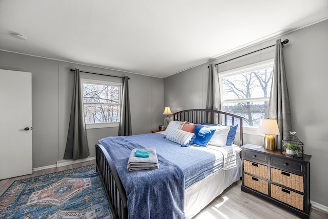 bedroom featuring light wood finished floors