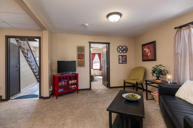 314 High St, Lake City, MN 55041 - living area featuring baseboards, a ceiling fan, carpet flooring, and stairway