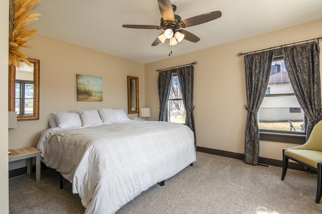 314 High St, Lake City, MN 55041 - bedroom with light colored carpet, baseboards, and a ceiling fan