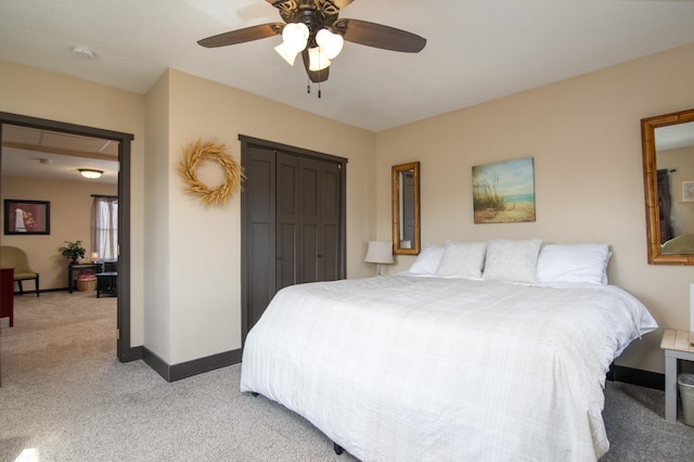314 High St, Lake City, MN 55041 - bedroom with light colored carpet, baseboards, a ceiling fan, and a closet