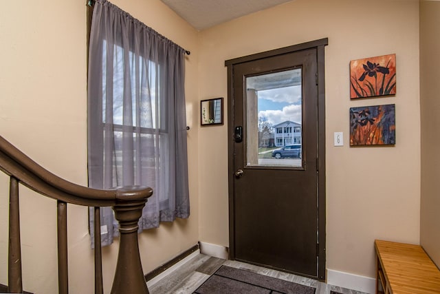 314 High St, Lake City, MN 55041 - doorway featuring wood finished floors and baseboards