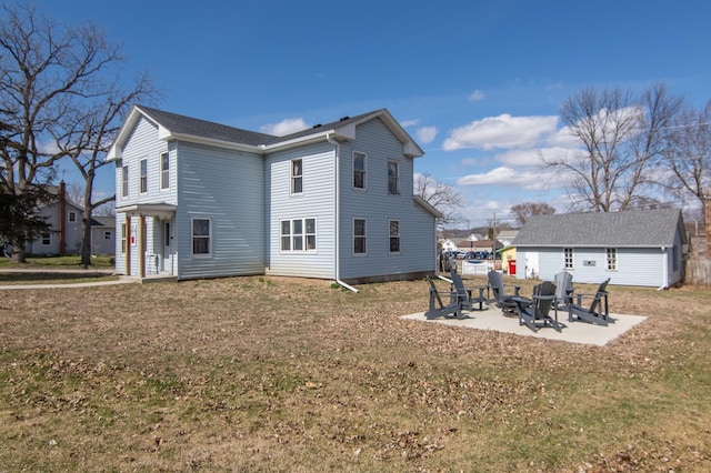 314 High St, Lake City, MN 55041 - rear view of house featuring a fire pit, a yard, and a patio