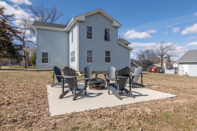 314 High St, Lake City, MN 55041 - back of property with a patio area and an outdoor fire pit