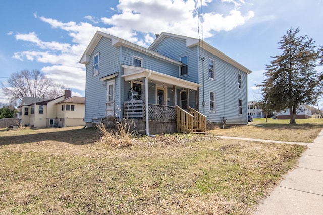 314 High St, Lake City, MN 55041 - traditional-style home featuring a porch and a front yard
