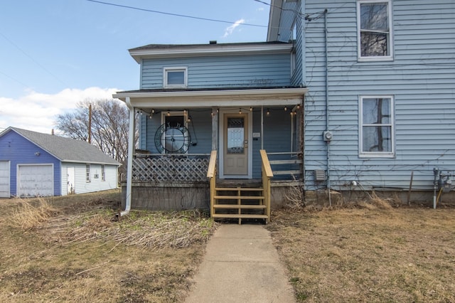 314 High St, Lake City, MN 55041 - traditional-style house with an outbuilding, a garage, and covered porch