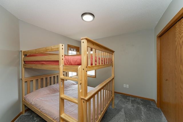 506 6th Pl NE, Byron, MN 55920 - carpeted bedroom featuring baseboards and a closet