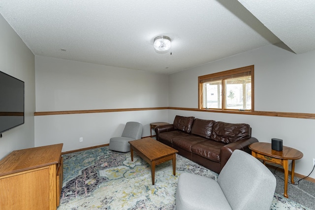 506 6th Pl NE, Byron, MN 55920 - carpeted living area featuring baseboards and a textured ceiling