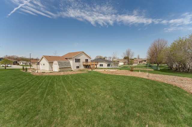 506 6th Pl NE, Byron, MN 55920 - exterior space with a lawn and a deck