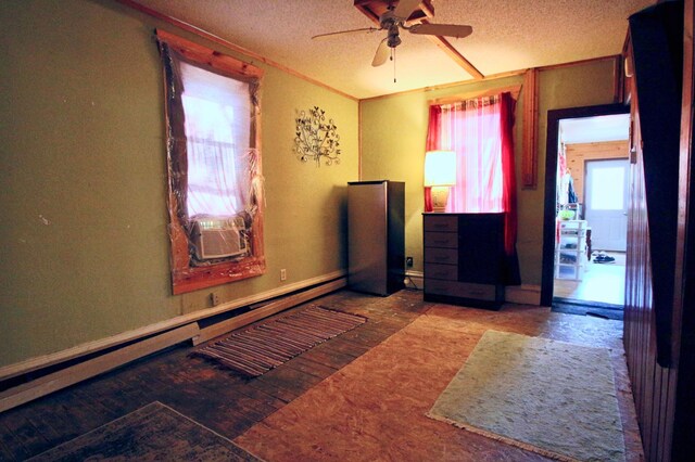 23585 Cross Dr, Deerwood, MN 56444 - bedroom with a baseboard radiator, wood finished floors, a textured ceiling, and cooling unit