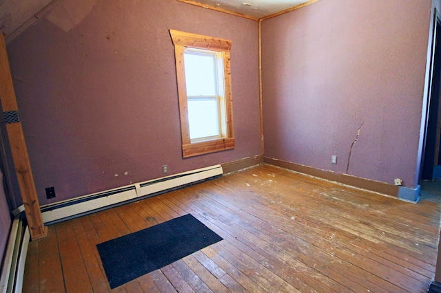 23585 Cross Dr, Deerwood, MN 56444 - unfurnished room featuring hardwood / wood-style flooring, a baseboard heating unit, and baseboards