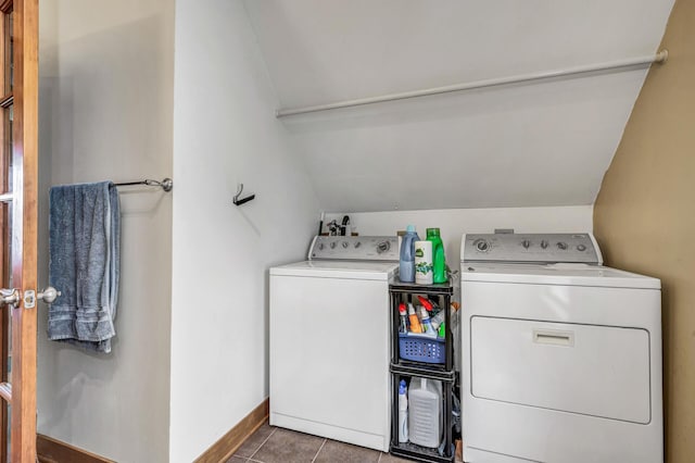 washroom with washer and dryer, laundry area, baseboards, and tile patterned floors