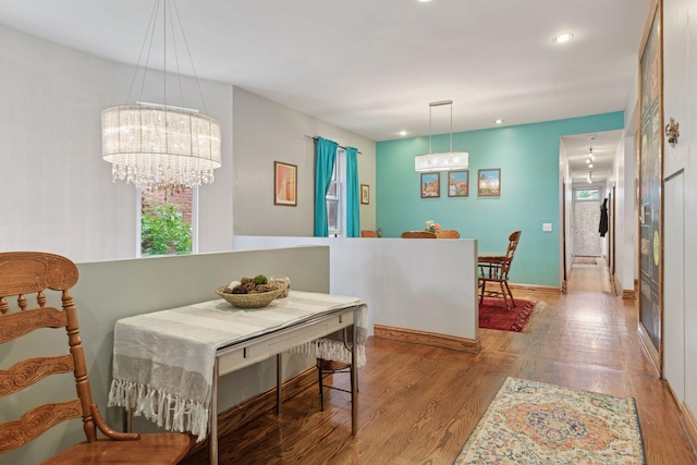 231 Arundel St Unit 1, Saint Paul, MN 55102 - dining room featuring wood finished floors, recessed lighting, healthy amount of natural light, and a chandelier
