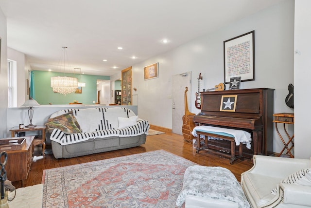 231 Arundel St Unit 1, Saint Paul, MN 55102 - living area featuring a chandelier, wood finished floors, and recessed lighting