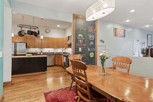 231 Arundel St Unit 1, Saint Paul, MN 55102 - dining space with light wood finished floors and recessed lighting
