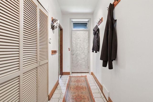 231 Arundel St Unit 1, Saint Paul, MN 55102 - doorway to outside with a heating unit and baseboards