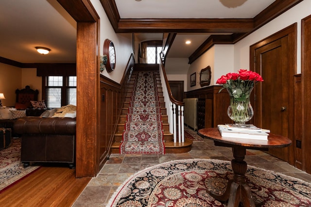 818 Summit Ave, Saint Paul, MN 55105 - foyer featuring ornamental molding, stairs, and wainscoting