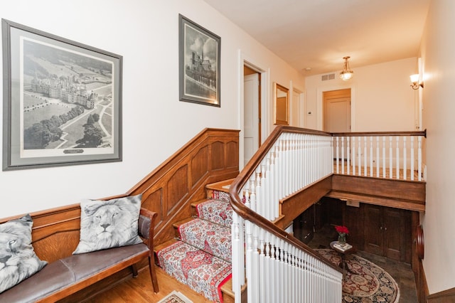 818 Summit Ave, Saint Paul, MN 55105 - staircase featuring wood finished floors