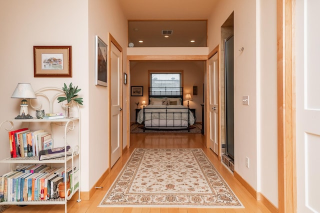 818 Summit Ave, Saint Paul, MN 55105 - hallway with light wood-style flooring and recessed lighting