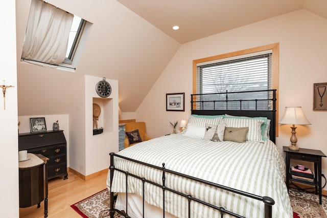 818 Summit Ave, Saint Paul, MN 55105 - bedroom featuring vaulted ceiling, light wood finished floors, baseboards, and recessed lighting