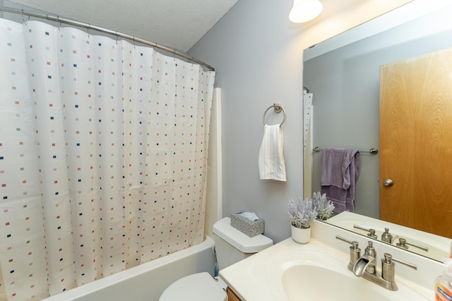 bathroom featuring toilet, shower / bath combo with shower curtain, and vanity