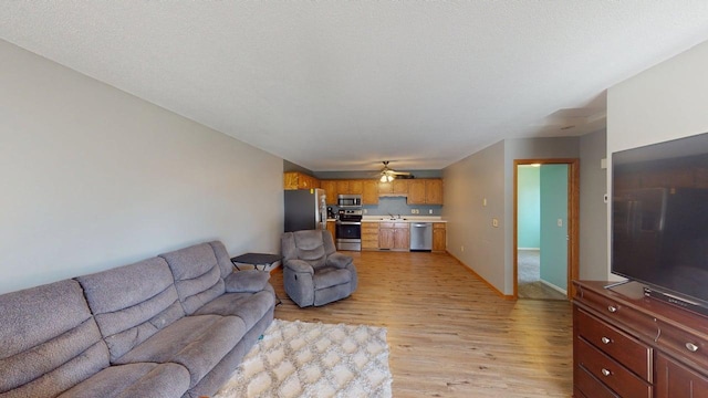 14190 Pineview Dr, Becker, MN 55308 - living area featuring light wood finished floors and ceiling fan