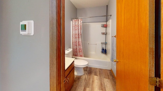 14190 Pineview Dr, Becker, MN 55308 - bathroom with wood finished floors, vanity, and shower / tub combo