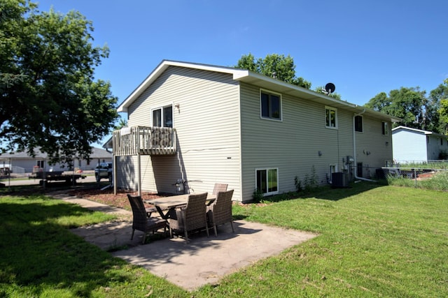 14190 Pineview Dr, Becker, MN 55308 - back of property with a patio and a balcony