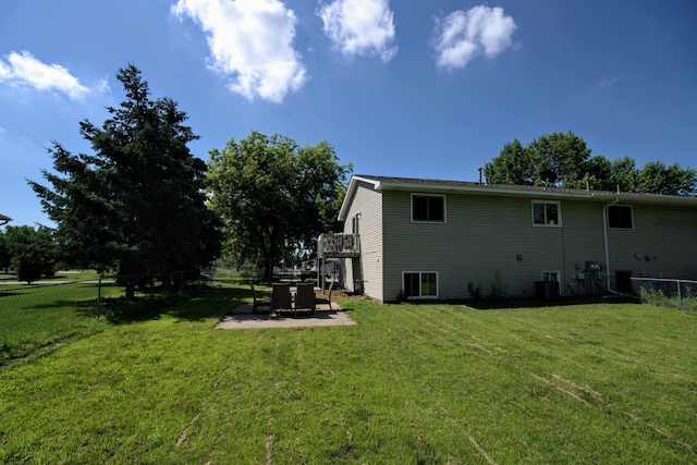 14190 Pineview Dr, Becker, MN 55308 - back of house featuring a fenced backyard and a patio area