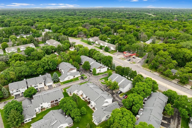 8722 Norway St NW, Coon Rapids, MN 55433 - aerial perspective of suburban area featuring a heavily wooded area