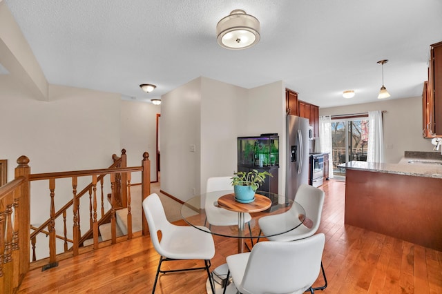 dining room featuring light wood-type flooring