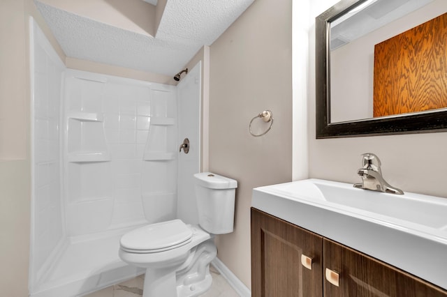 bathroom featuring a textured ceiling, baseboards, walk in shower, toilet, and vanity