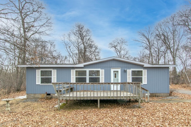 manufactured / mobile home featuring crawl space and a deck