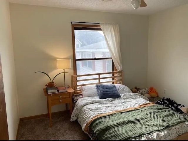 408 Lyon Ave, Lake City, MN 55041 - carpeted bedroom with a ceiling fan and baseboards
