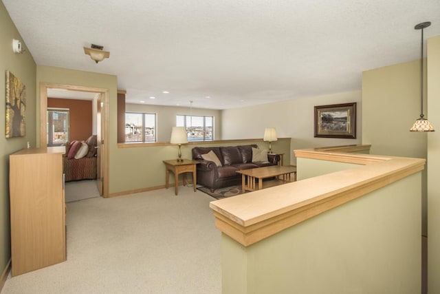 240 Spring St Unit 331, Saint Paul, MN 55102 - living room with light carpet, baseboards, and recessed lighting