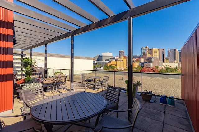 240 Spring St Unit 331, Saint Paul, MN 55102 - view of patio / terrace featuring outdoor dining space, a view of city, and a pergola