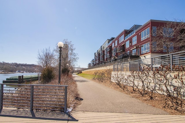 240 Spring St Unit 331, Saint Paul, MN 55102 - surrounding community with a water view and fence