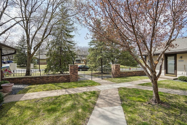 view of yard featuring a gate and a fenced front yard