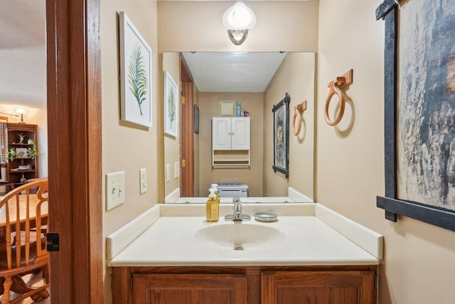 half bath featuring vanity