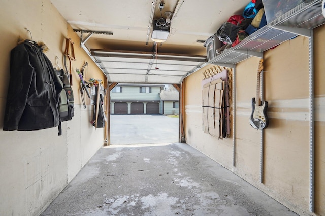 garage featuring a garage door opener