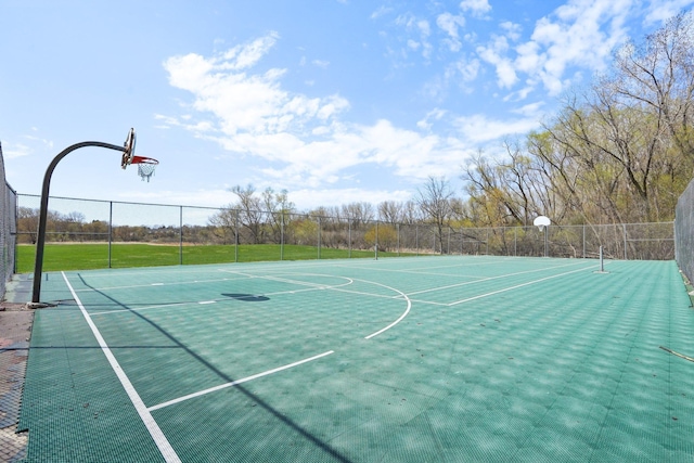 view of sport court featuring fence and community basketball court