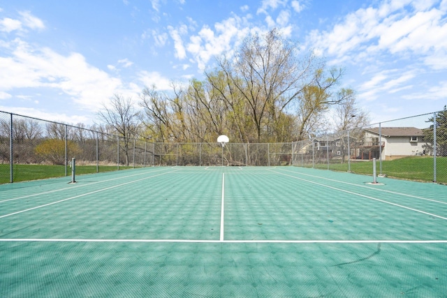 view of basketball court featuring community basketball court and fence