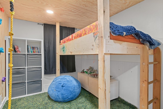carpeted bedroom with recessed lighting